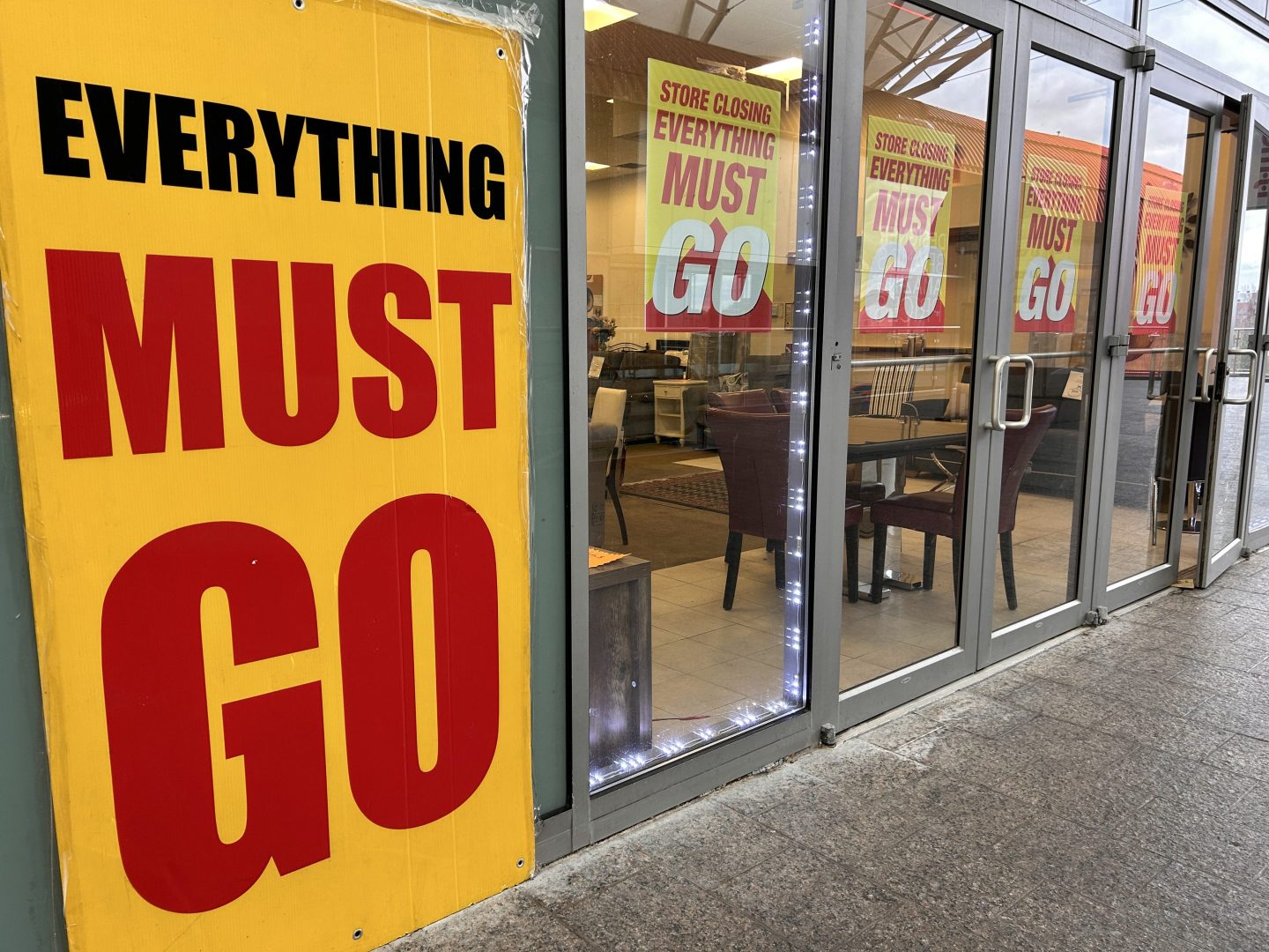 Everything Must Go sign in furniture store that's closing, Queens, New York. (Photo by: Lindsey Nicholson/UCG/Universal Images Group via Getty Images)
